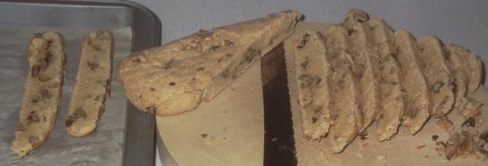 Preparing low fat biscotti for a second bake.